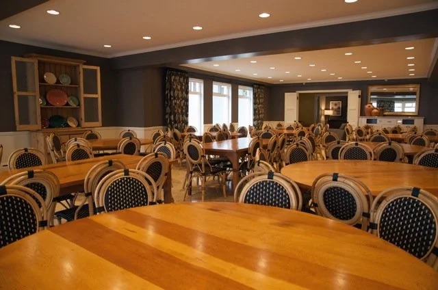 Dining room with round wooden tables