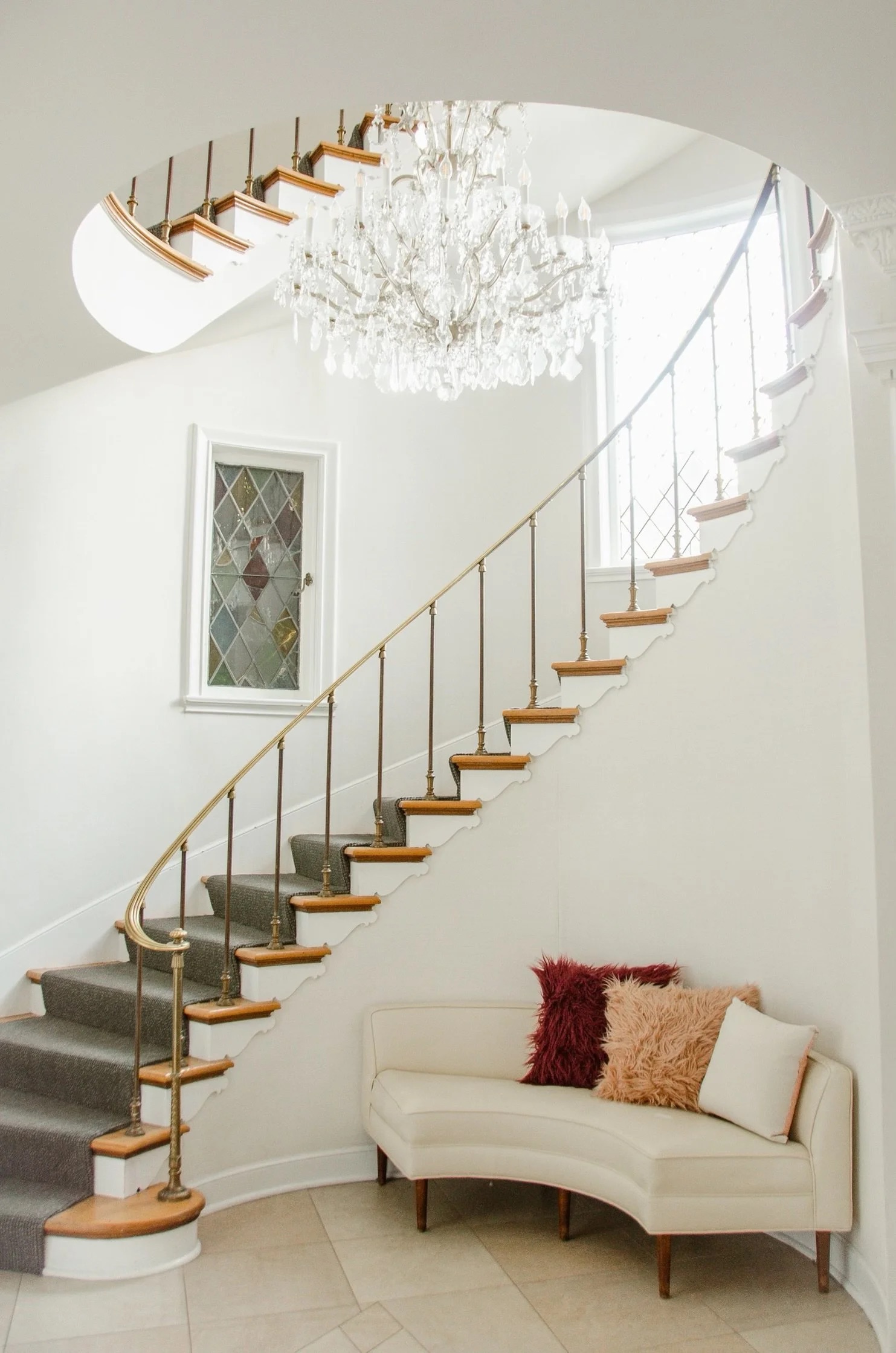 Elegant hallway with patterned wallpaper and lamps
