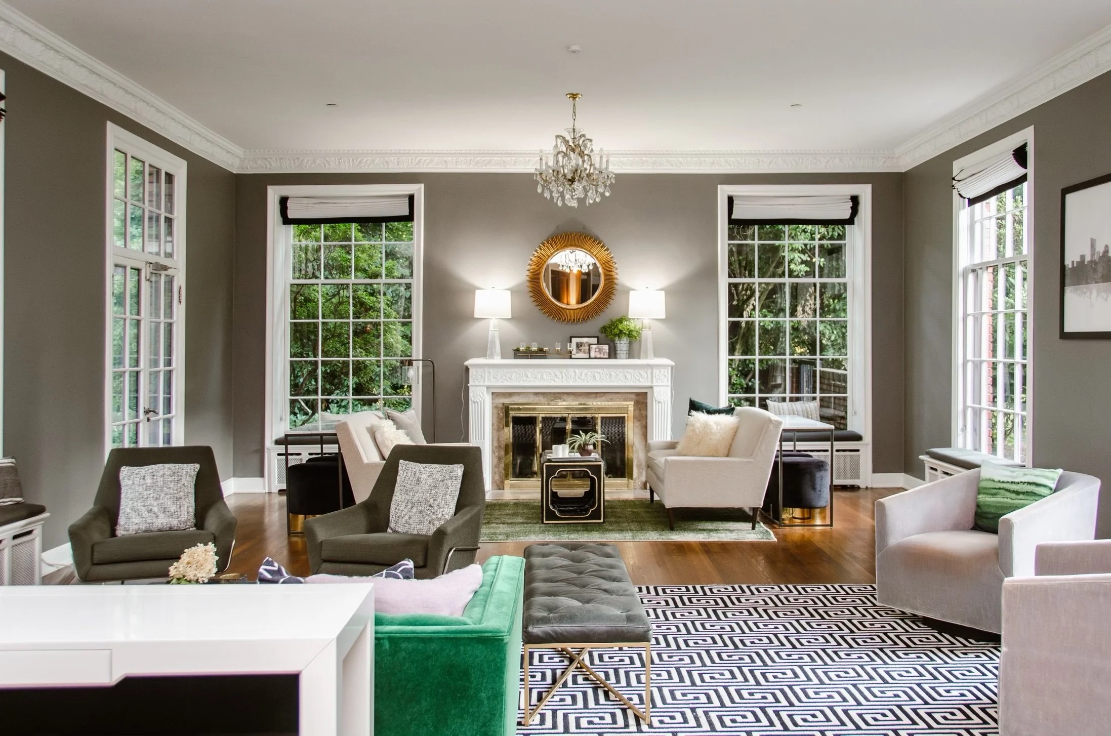 Formal living room with chandelier and fireplace