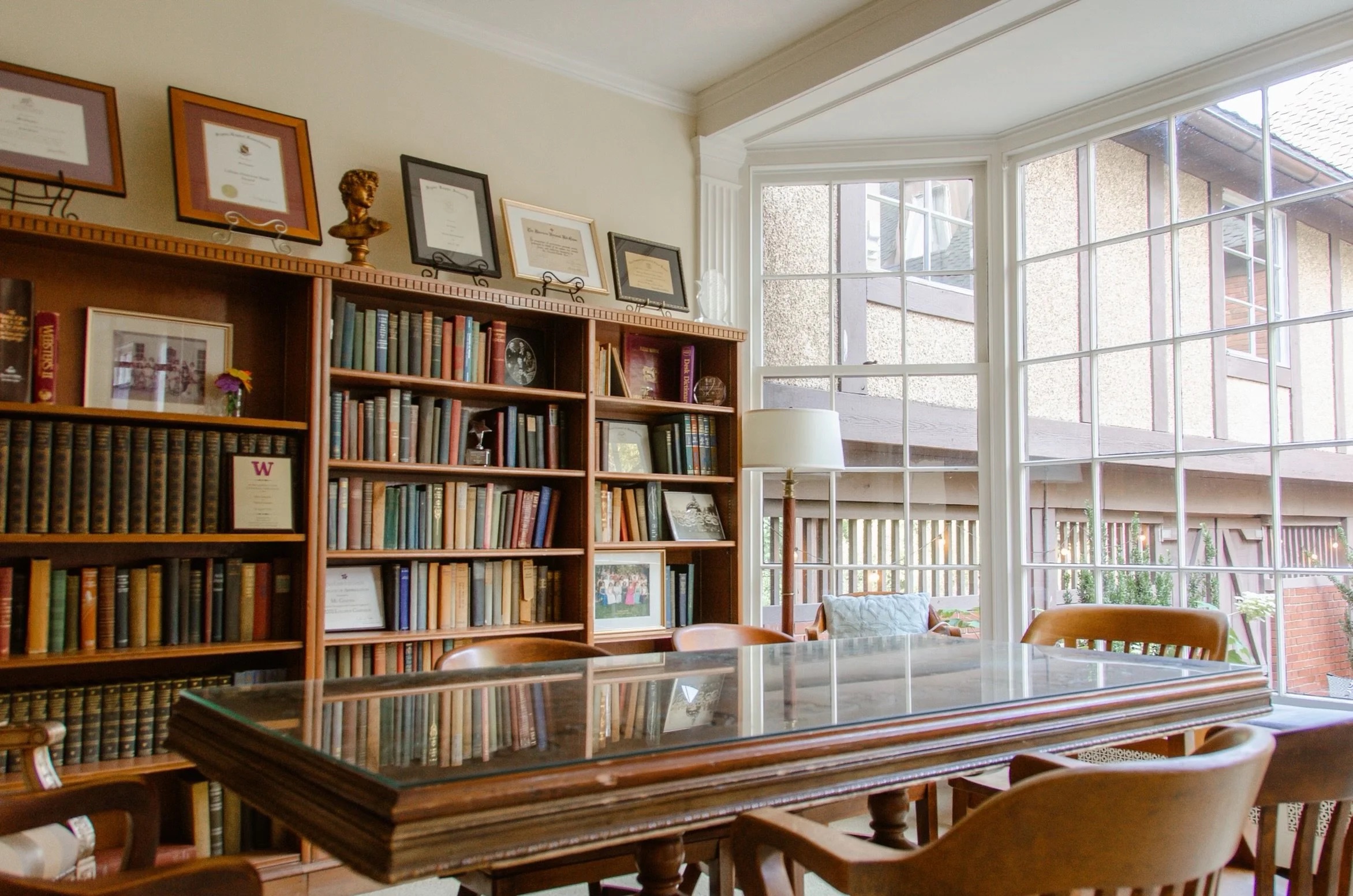 Study room with long tables and shelving